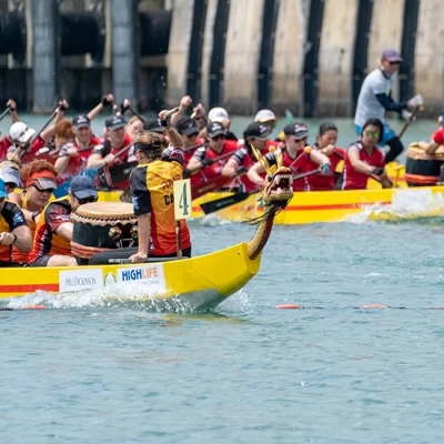 Dragon boats with Highlife Sponsor labels"